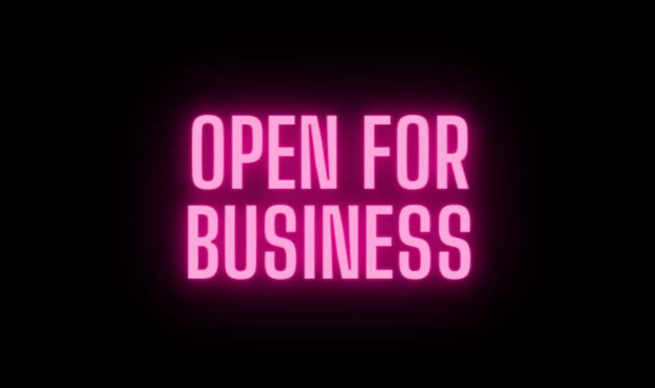 Black background with pink text "Open for business" to announce female electrician Tina Young's new business